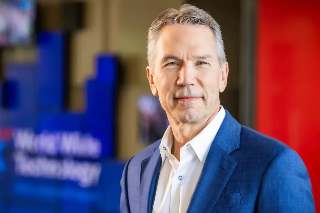 Jim Kavanaugh, founder and CEO of World Wide Technology, smiling in an office setting